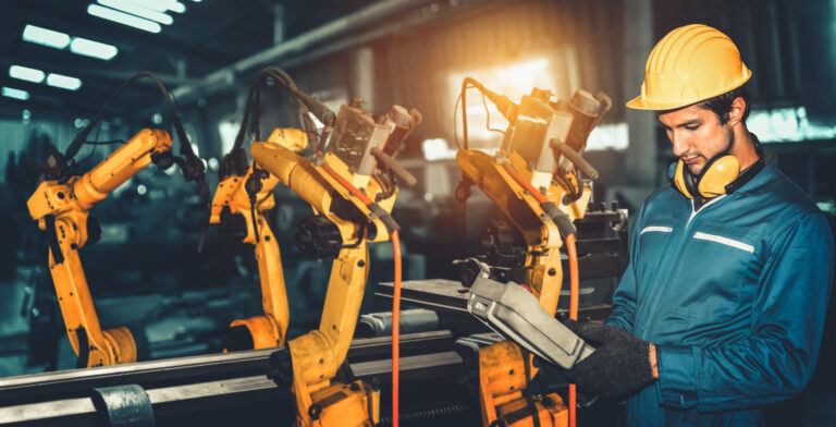 Smart industry robot arms for digital factory production technology showing automation manufacturing process of the Industry 4.0 or 4th industrial revolution and IOT software to control operation .